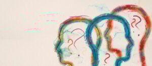 Watercolour outlines of heads with question marks inside them