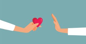 Illustration of a hand holding out a heart and another hand holding palm-up to reject it.
